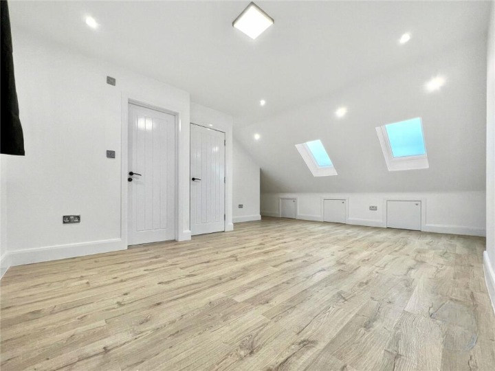 Bright completed loft room with rooflights